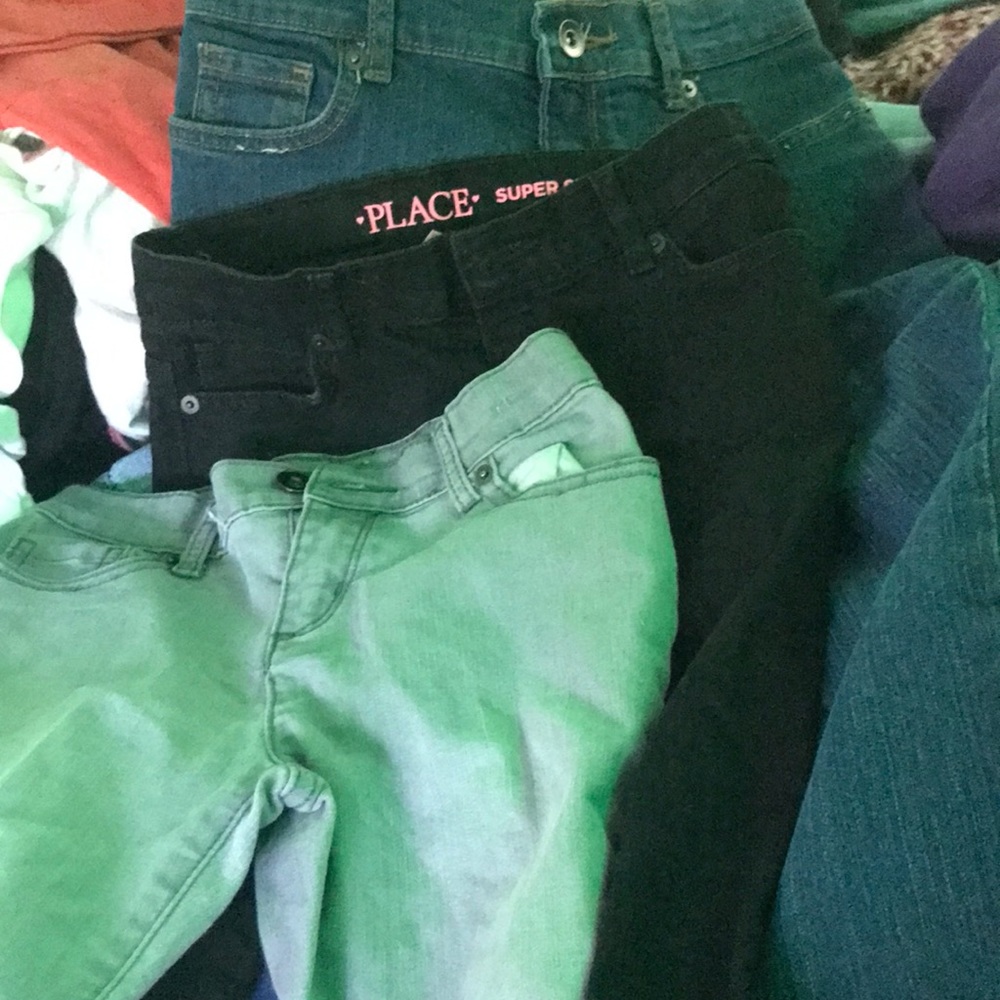 Blue, black, and grey skinned jeans